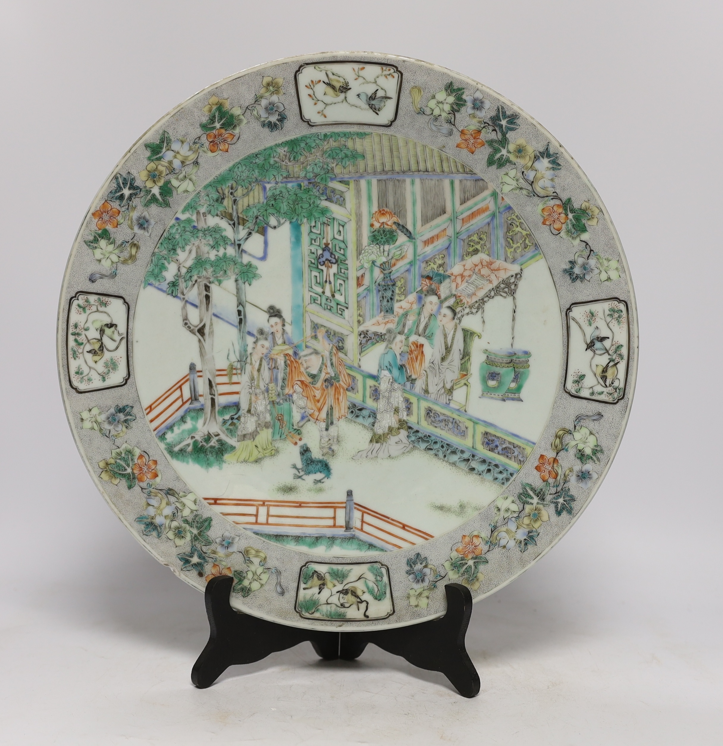 A Chinese famille verte ‘ladies’ dish, 19th century, chipped, 34cm diameter